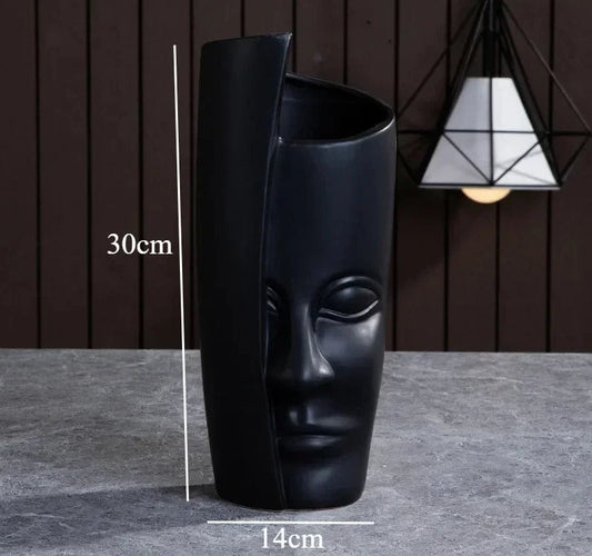 Vase visage noir