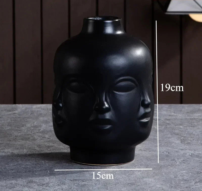 Vase visage noir