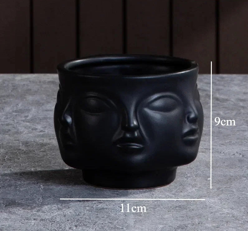 Vase visage noir