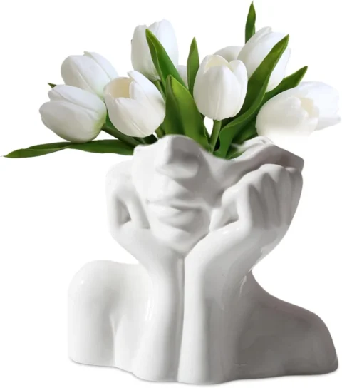 Petit vase tête de fille en céramique blanche