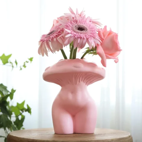 Vase corps de femme et champignon en résine rose